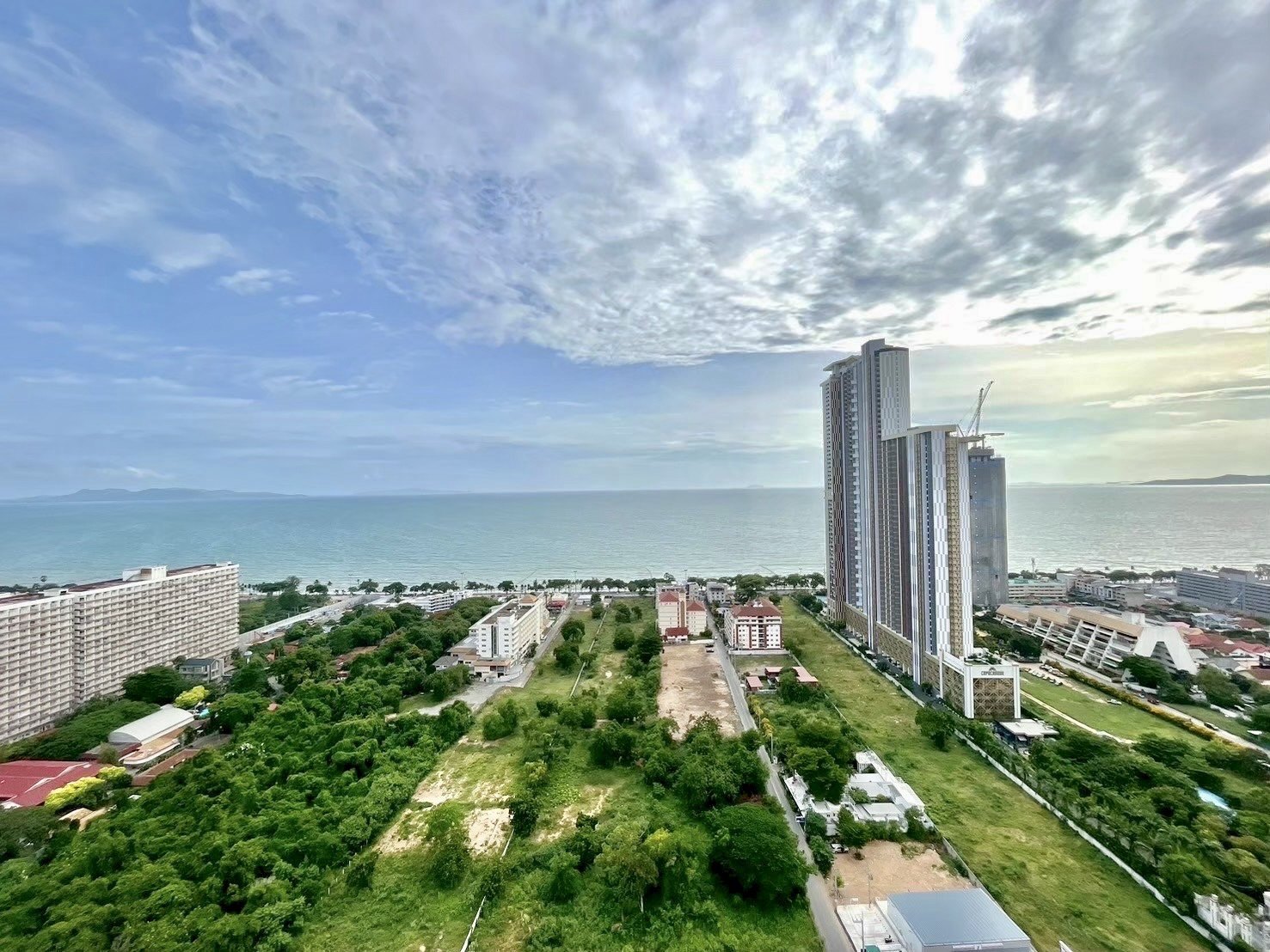 Aerial view of the twin towers beside the sea in Jomtien